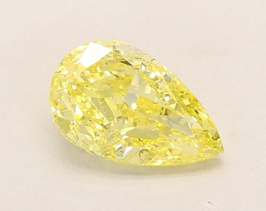 Loose Diamond - PEAR 1.95ct Fancy Vivid Yellow VVS2: Loose Diamond - PEAR 1.95ct Fancy Vivid Yellow VVS2 Source: This is a real non-mined Diamond that has been grown in a lab Shape: PEAR Carats: 1.95 Color: Fancy Vivid Yellow Certification: IGI Video: