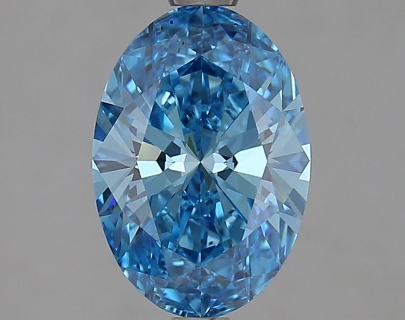 Loose Diamond - OVAL 1.81ct Fancy Vivid Blue VS2: Loose Diamond - OVAL 1.81ct Fancy Vivid Blue VS2 Source: This is a real non-mined Diamond that has been grown in a lab Shape: OVAL Carats: 1.81 Color: Fancy Vivid Blue Certification: IGI Video: