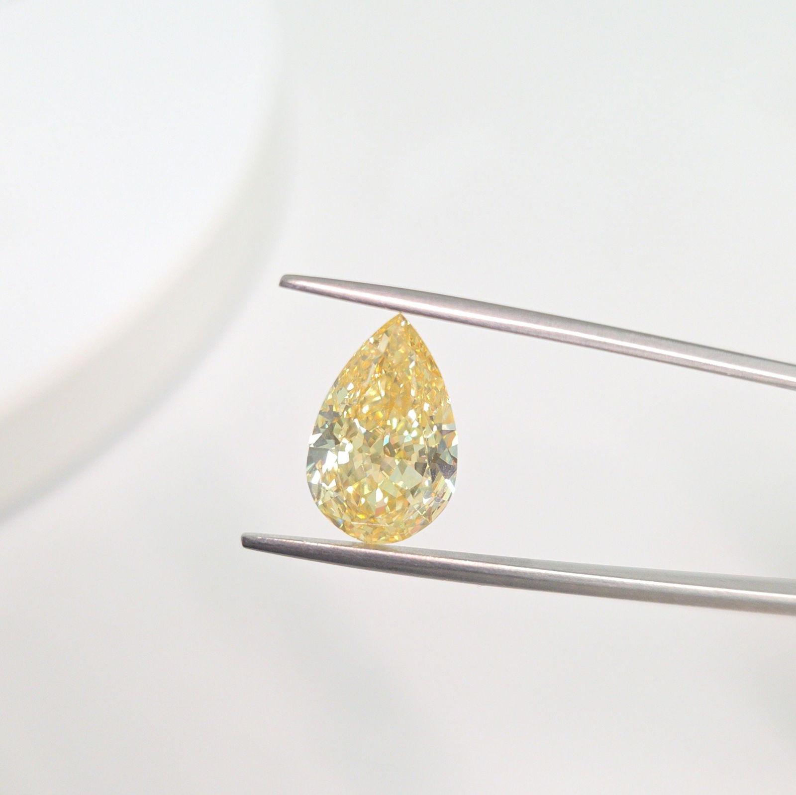 Loose Diamond - PEAR 5.56ct Fancy Intense Yellow VS1: Loose Diamond - PEAR 5.56ct Fancy Intense Yellow VS1 Source: This is a real non-mined Diamond that has been grown in a lab Shape: PEAR Carats: 5.56 Color: Fancy Intense Yellow Certification: IGI Video