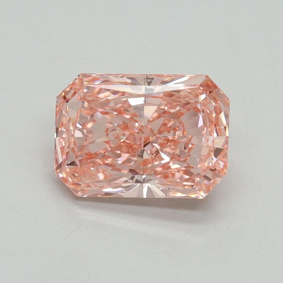 Loose Diamond - RADIANT 1.55ct Fancy Vivid Pink VS2: Loose Diamond - RADIANT 1.55ct Fancy Vivid Pink VS2 Source: This is a real non-mined Diamond that has been grown in a lab Shape: RADIANT Carats: 1.55 Color: Fancy Vivid Pink Certification: IGI Video:
