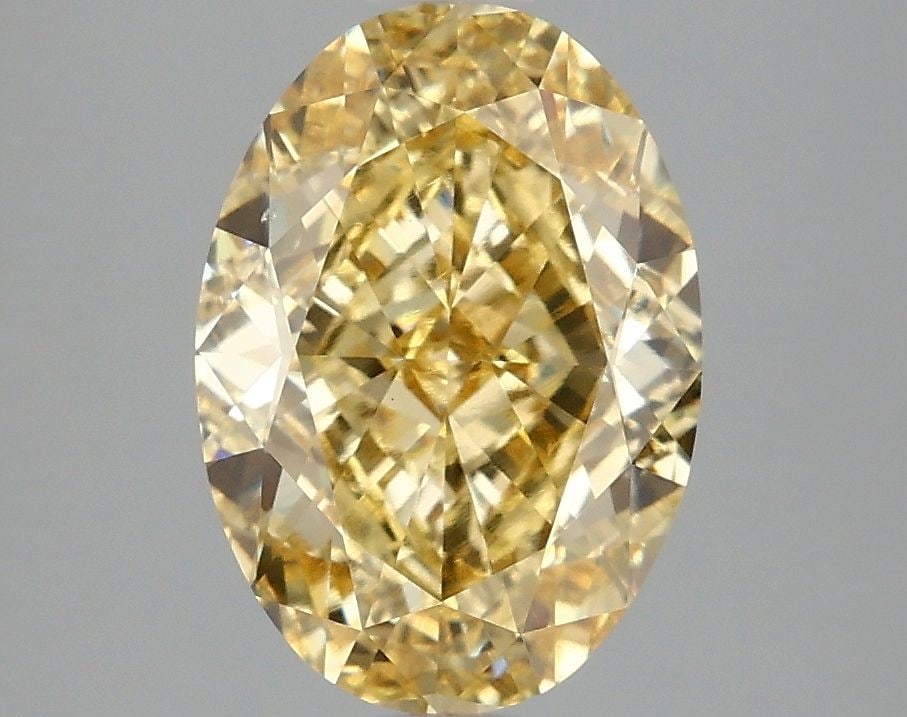 Loose Diamond - OVAL 3.05ct Fancy Intense Yellow VS1: Loose Diamond - OVAL 3.05ct Fancy Intense Yellow VS1 Source: This is a real non-mined Diamond that has been grown in a lab Shape: OVAL Carats: 3.05 Color: Fancy Intense Yellow Certification: IGI Video