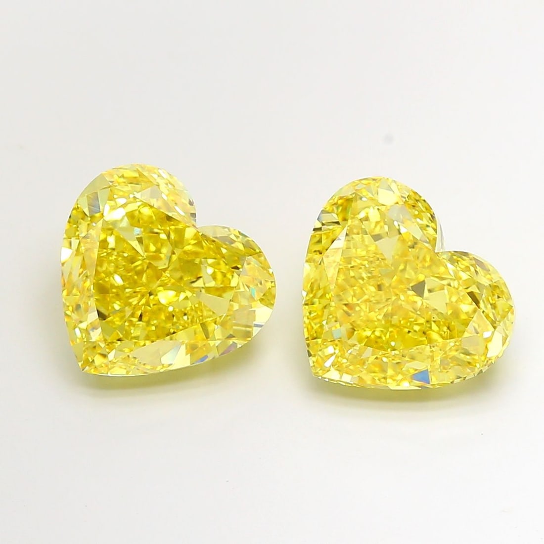 Loose Diamond - HEART 10.06ct Fancy Vivid Yellow VS1: Loose Diamond - HEART 10.06ct Fancy Vivid Yellow VS1 Source: This is a real non-mined Diamond that has been grown in a lab Shape: HEART Carats: 10.06 Color: Fancy Vivid Yellow Certification: IGI Video
