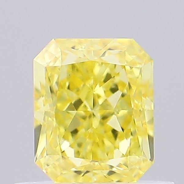 Loose Diamond - RADIANT 0.6ct Fancy Vivid Yellow VS1: Loose Diamond - RADIANT 0.6ct Fancy Vivid Yellow VS1 Source: This is a real non-mined Diamond that has been grown in a lab Shape: RADIANT Carats: 0.6 Color: Fancy Vivid Yellow Certification: IGI Video