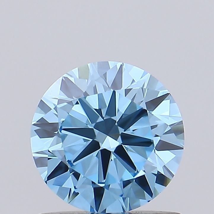 Loose Diamond - ROUND 0.89ct Fancy Vivid Blue VVS2: Loose Diamond - ROUND 0.89ct Fancy Vivid Blue VVS2 Source: This is a real non-mined Diamond that has been grown in a lab Shape: ROUND Carats: 0.89 Color: Fancy Vivid Blue Certification: IGI Video: