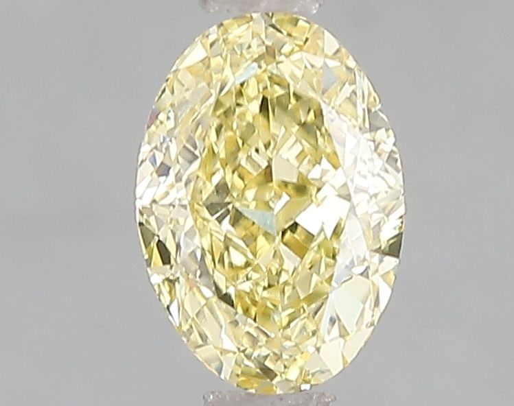 Loose Diamond - OVAL 1.08ct Fancy Intense Yellow VS1: Loose Diamond - OVAL 1.08ct Fancy Intense Yellow VS1 Source: This is a real non-mined Diamond that has been grown in a lab Shape: OVAL Carats: 1.08 Color: Fancy Intense Yellow Certification: IGI Video