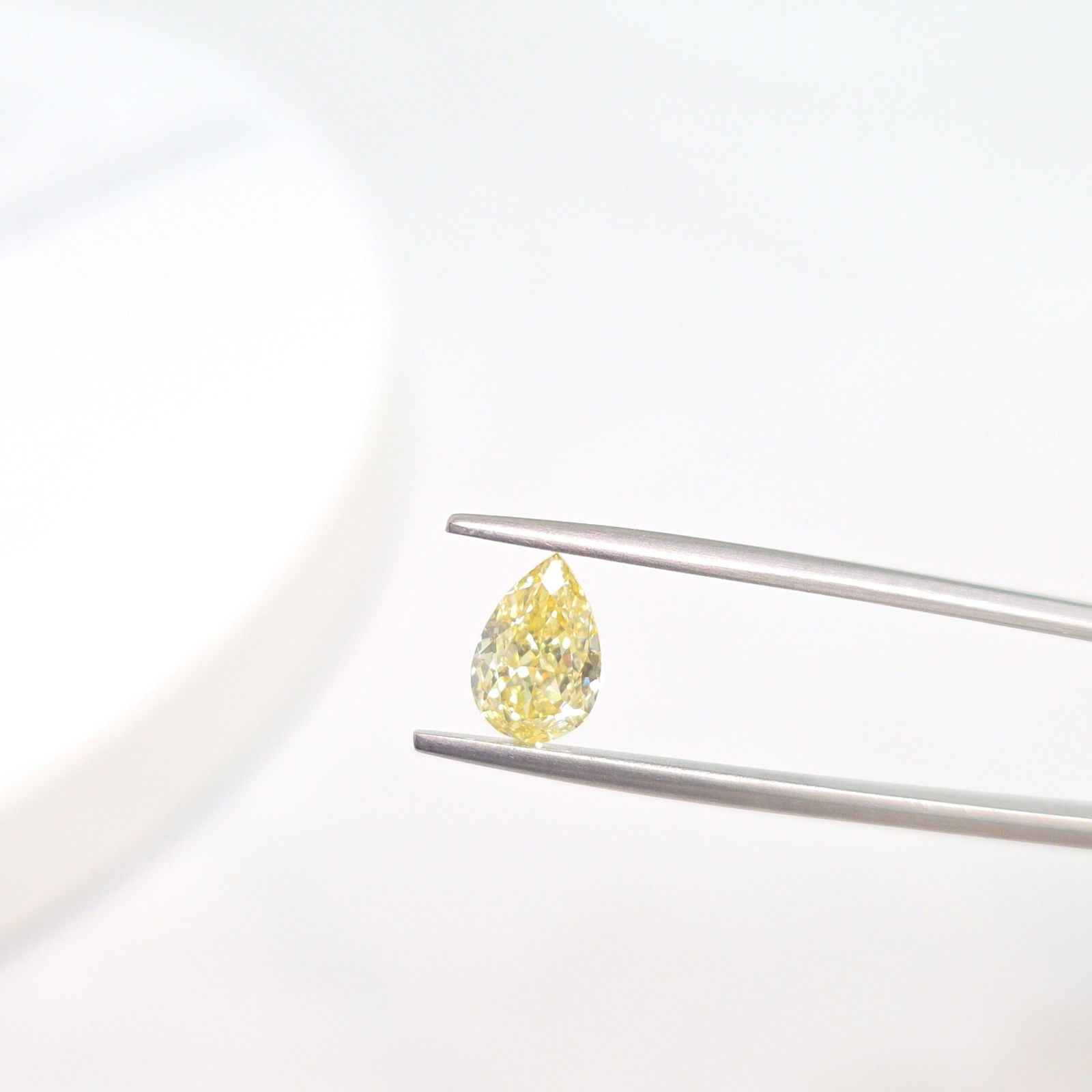 Loose Diamond - PEAR 1.29ct Fancy Intense Yellow VS1: Loose Diamond - PEAR 1.29ct Fancy Intense Yellow VS1 Source: This is a real non-mined Diamond that has been grown in a lab Shape: PEAR Carats: 1.29 Color: Fancy Intense Yellow Certification: IGI Video