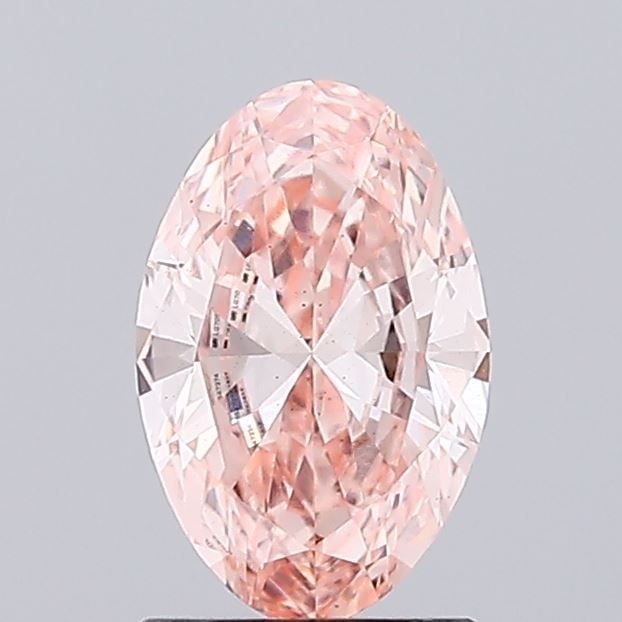 Loose Diamond - OVAL 1.09ct Fancy Intense Orangey Pink SI1: Loose Diamond - OVAL 1.09ct Fancy Intense Orangey Pink SI1 Source: This is a real non-mined Diamond that has been grown in a lab Shape: OVAL Carats: 1.09 Color: Fancy Intense Orangey Pink Certificatio