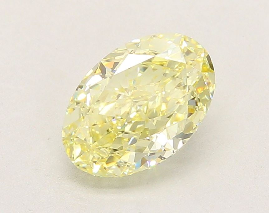 Loose Diamond - OVAL 2.08ct Fancy Light Yellow VVS2: Loose Diamond - OVAL 2.08ct Fancy Light Yellow VVS2 Source: This is a real non-mined Diamond that has been grown in a lab Shape: OVAL Carats: 2.08 Color: Fancy Light Yellow Certification: IGI Video: