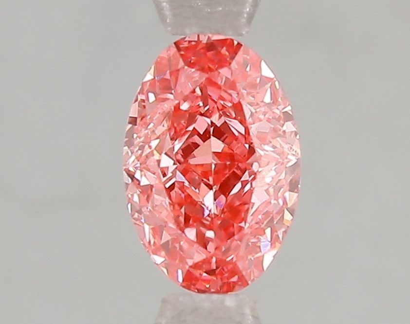 Loose Diamond - OVAL 1.05ct Fancy Vivid Pink VS1: Loose Diamond - OVAL 1.05ct Fancy Vivid Pink VS1 Source: This is a real non-mined Diamond that has been grown in a lab Shape: OVAL Carats: 1.05 Color: Fancy Vivid Pink Certification: IGI Video: