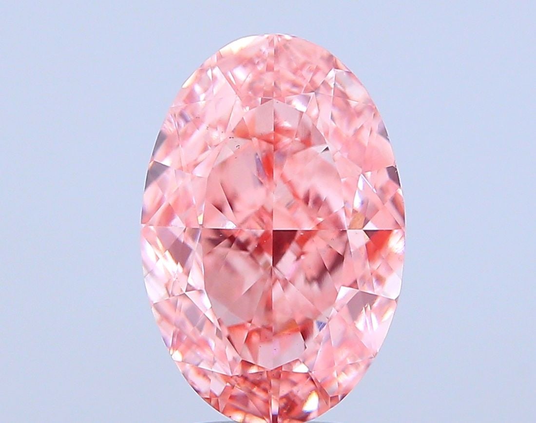 Loose Diamond - OVAL 5.07ct Fancy Vivid Pink VS2: Loose Diamond - OVAL 5.07ct Fancy Vivid Pink VS2 Source: This is a real non-mined Diamond that has been grown in a lab Shape: OVAL Carats: 5.07 Color: Fancy Vivid Pink Certification: IGI Video: