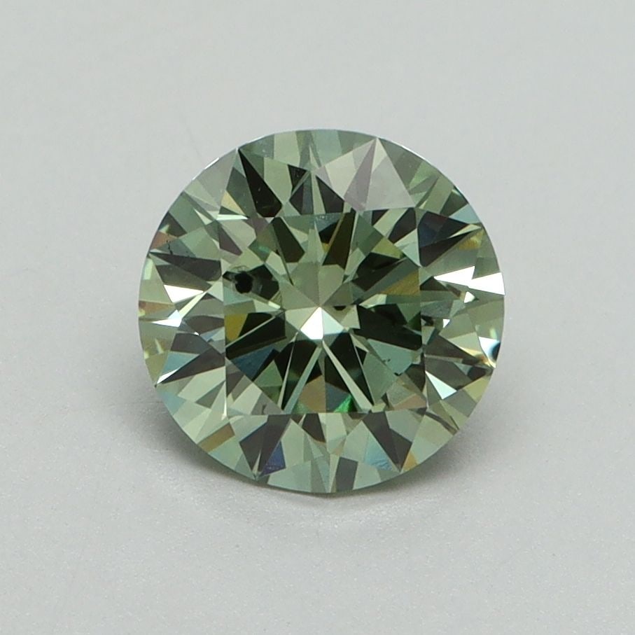 Loose Diamond - ROUND 1.23ct Fancy Vivid Green SI2: Loose Diamond - ROUND 1.23ct Fancy Vivid Green SI2 Source: This is a real non-mined Diamond that has been grown in a lab Shape: ROUND Carats: 1.23 Color: Fancy Vivid Green Certification: IGI Video: