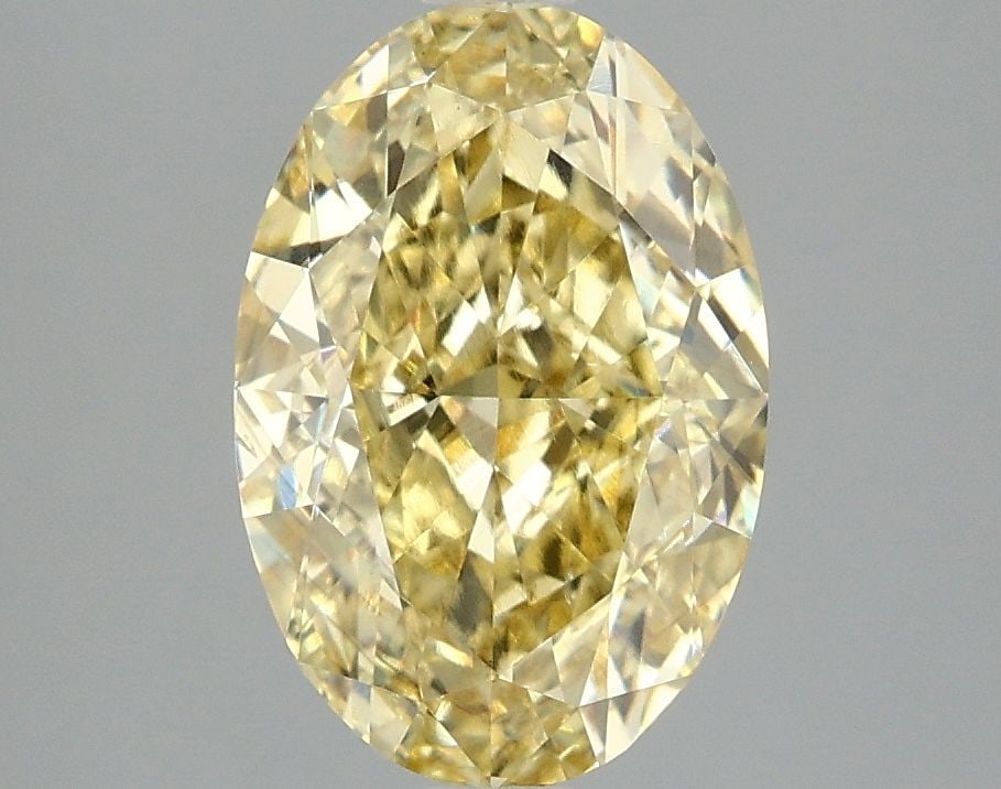 Loose Diamond - OVAL 3.01ct Fancy Vivid Yellow VS1: Loose Diamond - OVAL 3.01ct Fancy Vivid Yellow VS1 Source: This is a real non-mined Diamond that has been grown in a lab Shape: OVAL Carats: 3.01 Color: Fancy Vivid Yellow Certification: IGI Video: