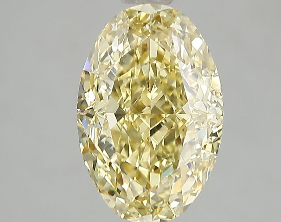 Loose Diamond - OVAL 1.22ct Fancy Intense Yellow VS2: Loose Diamond - OVAL 1.22ct Fancy Intense Yellow VS2 Source: This is a real non-mined Diamond that has been grown in a lab Shape: OVAL Carats: 1.22 Color: Fancy Intense Yellow Certification: IGI Video