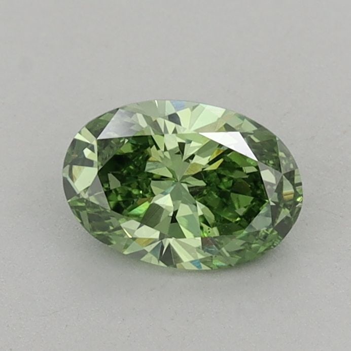 Loose Diamond - OVAL 0.57ct Fancy Vivid Green VS1: Loose Diamond - OVAL 0.57ct Fancy Vivid Green VS1 Source: This is a real non-mined Diamond that has been grown in a lab Shape: OVAL Carats: 0.57 Color: Fancy Vivid Green Certification: IGI Video: