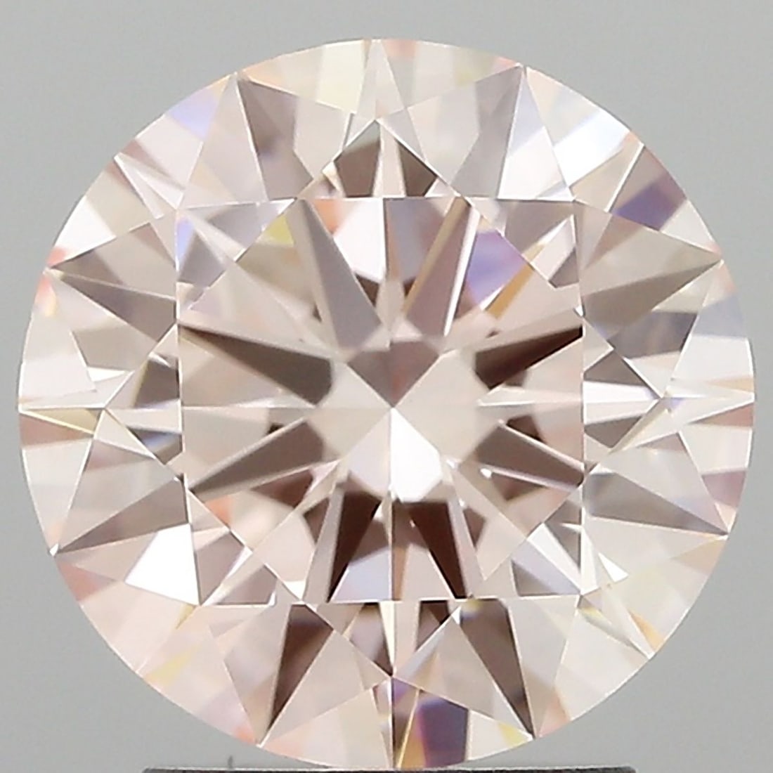 Ideal Loose Diamond - ROUND 2.53ct Fancy Pink VVS2: Ideal Loose Diamond - ROUND 2.53ct Fancy Pink VVS2 Source: This is a real non-mined Diamond that has been grown in a lab Shape: ROUND Carats: 2.53 Color: Fancy Pink Certification: IGI Video: