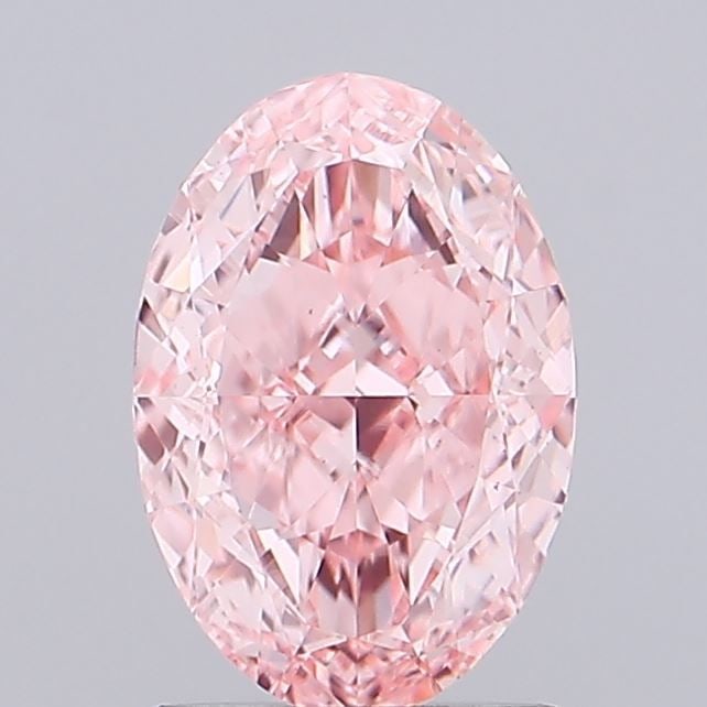 Loose Diamond - OVAL 1.09ct Fancy Vivid Pink VS1: Loose Diamond - OVAL 1.09ct Fancy Vivid Pink VS1 Source: This is a real non-mined Diamond that has been grown in a lab Shape: OVAL Carats: 1.09 Color: Fancy Vivid Pink Certification: IGI Video: