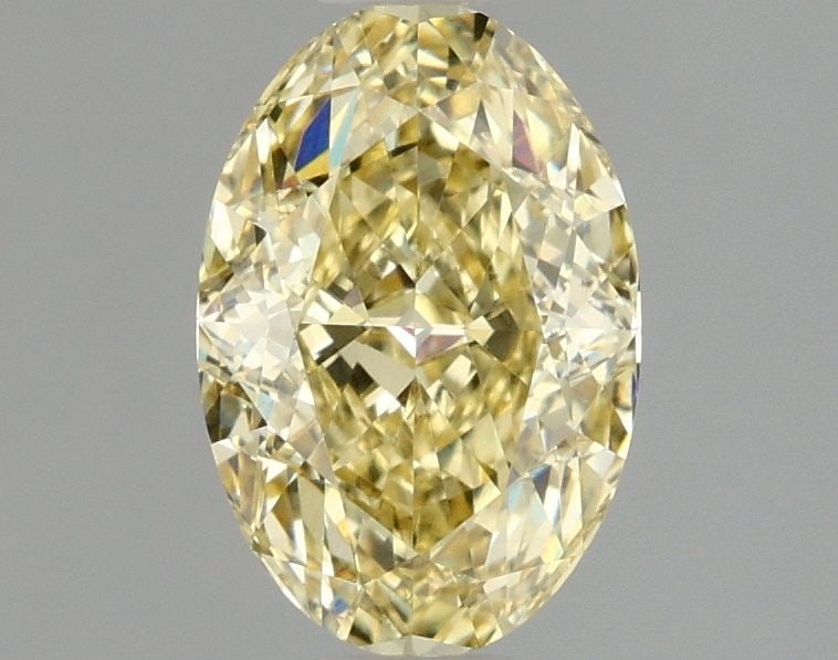 Loose Diamond - OVAL 1.58ct Fancy Intense Yellow VS1: Loose Diamond - OVAL 1.58ct Fancy Intense Yellow VS1 Source: This is a real non-mined Diamond that has been grown in a lab Shape: OVAL Carats: 1.58 Color: Fancy Intense Yellow Certification: IGI Video