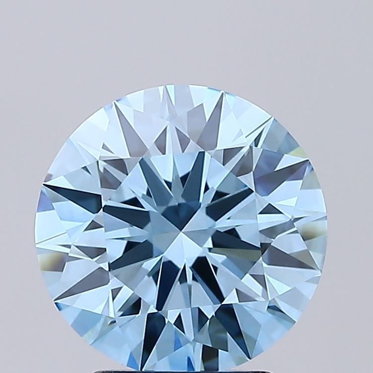 Ideal Loose Diamond - ROUND 2.61ct Fancy Vivid Blue VVS2: Ideal Loose Diamond - ROUND 2.61ct Fancy Vivid Blue VVS2 Source: This is a real non-mined Diamond that has been grown in a lab Shape: ROUND Carats: 2.61 Color: Fancy Vivid Blue Certification: IGI Vide