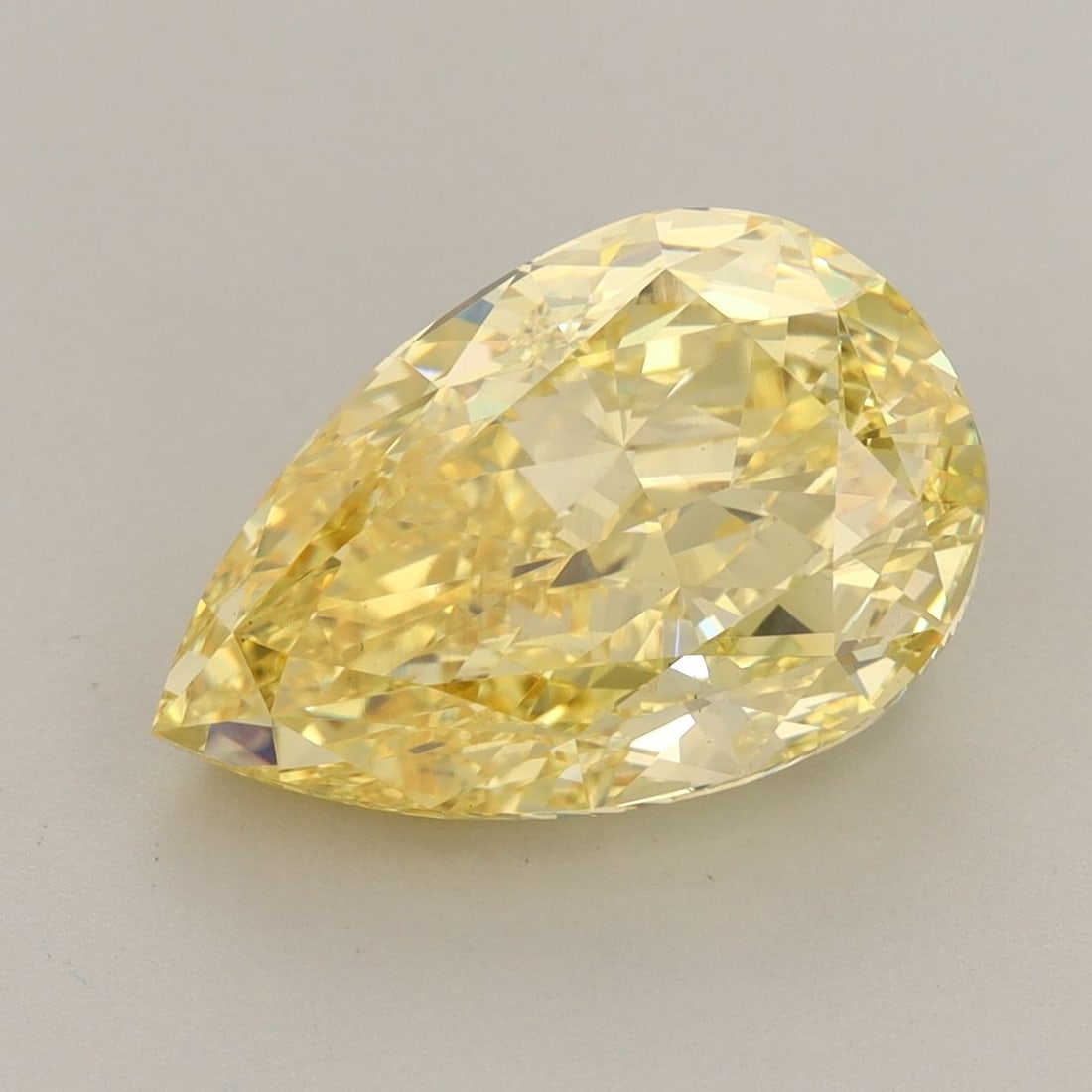 Loose Diamond - PEAR 5.72ct Fancy Vivid Yellow VS1: Loose Diamond - PEAR 5.72ct Fancy Vivid Yellow VS1 Source: This is a real non-mined Diamond that has been grown in a lab Shape: PEAR Carats: 5.72 Color: Fancy Vivid Yellow Certification: IGI Video: