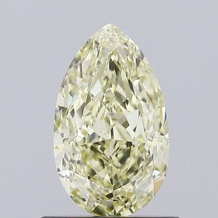 Loose Diamond - PEAR 0.93ct Fancy Yellow VS2: Loose Diamond - PEAR 0.93ct Fancy Yellow VS2 Source: This is a real non-mined Diamond that has been grown in a lab Shape: PEAR Carats: 0.93 Color: Fancy Yellow Certification: IGI Video: