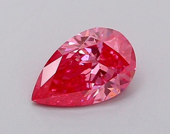 Loose Diamond - PEAR 0.83ct Fancy Vivid Pink VS2: Loose Diamond - PEAR 0.83ct Fancy Vivid Pink VS2 Source: This is a real non-mined Diamond that has been grown in a lab Shape: PEAR Carats: 0.83 Color: Fancy Vivid Pink Certification: IGI Video: