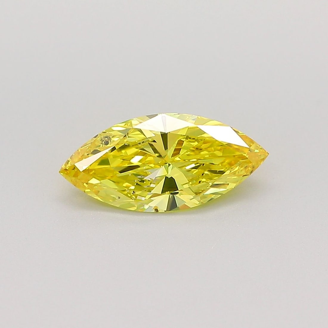 Loose Diamond - MARQUISE 0.99ct Fancy Vivid Yellow SI1: Loose Diamond - MARQUISE 0.99ct Fancy Vivid Yellow SI1 Source: This is a real non-mined Diamond that has been grown in a lab Shape: MARQUISE Carats: 0.99 Color: Fancy Vivid Yellow Certification: IGI V