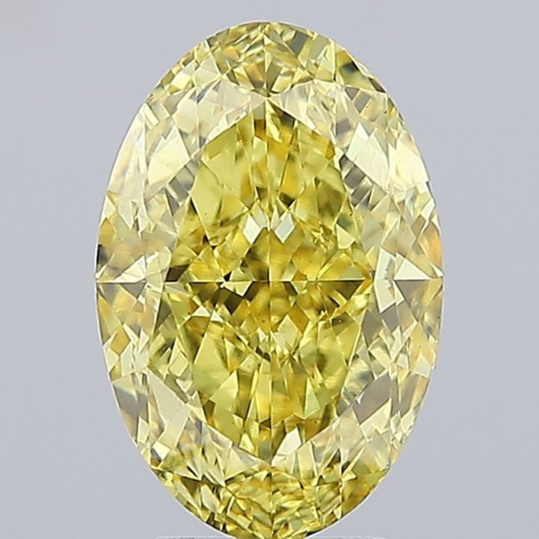 Loose Diamond - OVAL 6.03ct Fancy Vivid Yellow VS2: Loose Diamond - OVAL 6.03ct Fancy Vivid Yellow VS2 Source: This is a real non-mined Diamond that has been grown in a lab Shape: OVAL Carats: 6.03 Color: Fancy Vivid Yellow Certification: IGI Video: