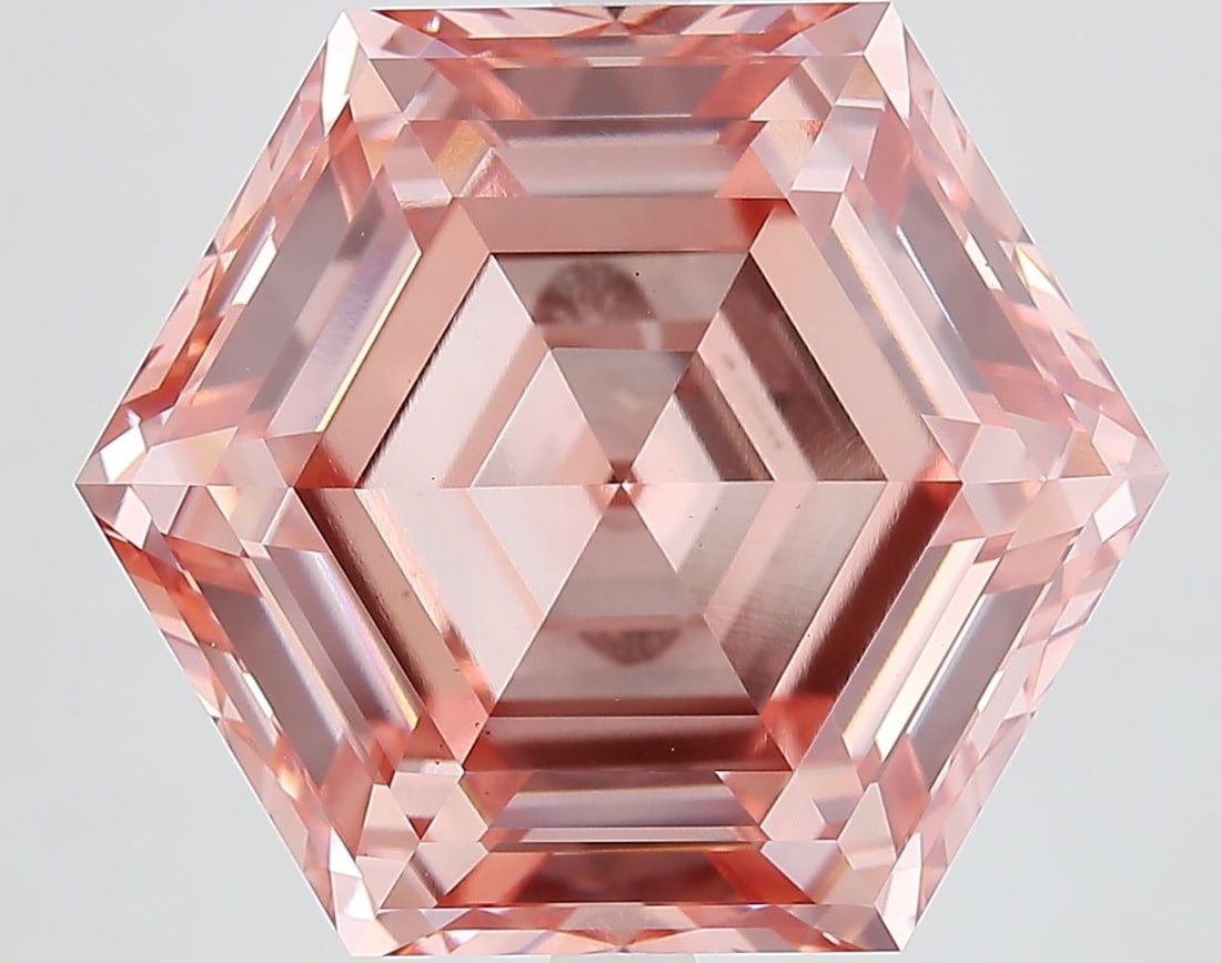 Loose Diamond - HEXAGONAL 13.1ct Fancy Vivid Pink VS1: Loose Diamond - HEXAGONAL 13.1ct Fancy Vivid Pink VS1 Source: This is a real non-mined Diamond that has been grown in a lab Shape: HEXAGONAL Carats: 13.1 Color: Fancy Vivid Pink Certification: IGI Vid