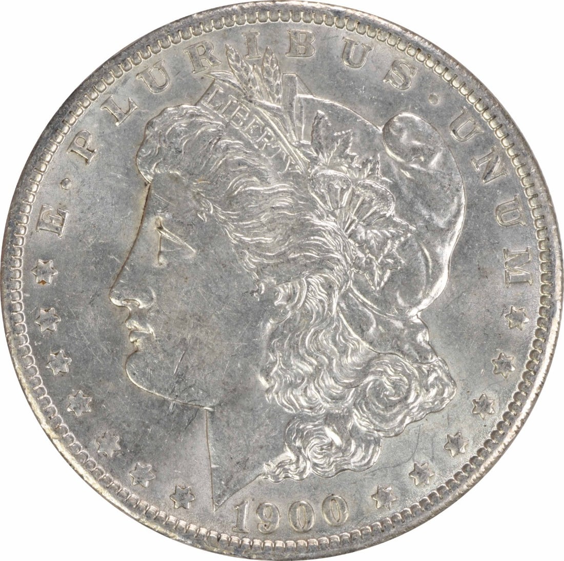 1900 Morgan Silver Dollar AU Uncertified 90% Silver Coin: 1900 Morgan Silver Dollar AU Uncertified 90% Silver Coin This 1900 Morgan Silver Dollar is an attractive piece with an AU (About Uncirculated) grade, showcasing its historical significance and craftsm