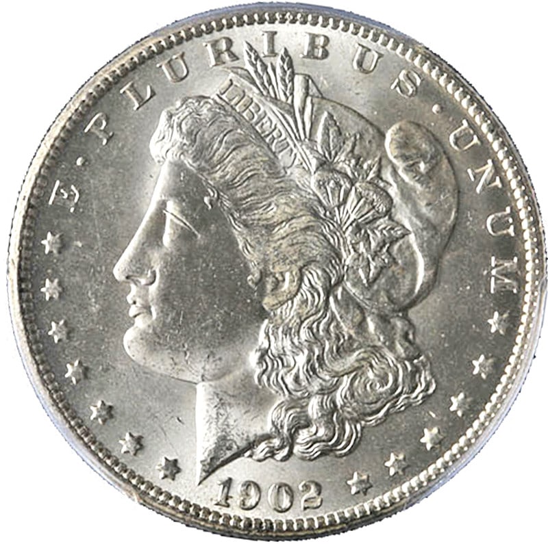 PCGS MS65 1902-O Morgan Dollar Uncirculated Silver Gem: PCGS MS65 1902-O Morgan Dollar Uncirculated Silver Gem This is an original 1902-O Morgan Silver Dollar, certified by PCGS with a grade of MS65. The coin is uncirculated and features a bright, white ap