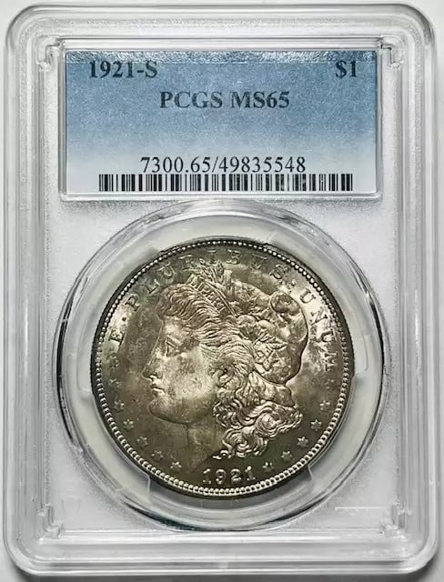 1921 S Morgan Silver Dollar PCGS MS 65 Uncirculated Silver Coin: 1921 S Morgan Silver Dollar PCGS MS 65 Uncirculated Silver Coin This 1921 S Morgan Silver Dollar is a stunning example of American coinage, featuring a high-grade MS 65 certification from PCGS. Struck
