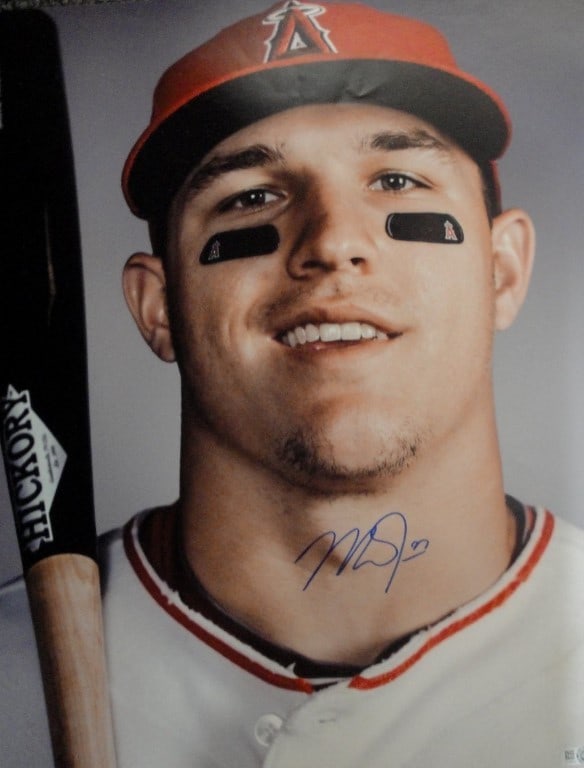 Mike Trout Autographed 16x20 Photo MLB Authentic Anaheim Angels: Mike Trout Autographed 16x20 Photo MLB Authentic Anaheim Angels This stunning 16x20 close-up photo captures MLB superstar Mike Trout in action, showcasing his intense focus with bat in hand. This item