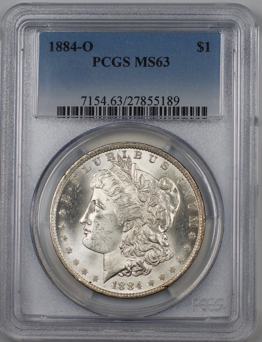 PCGS MS-63 1884-O Morgan Dollar New Orleans Mint Silver Coin: PCGS MS-63 1884-O Morgan Dollar New Orleans Mint Silver Coin This is an 1884-O Morgan Silver Dollar graded MS-63 by PCGS. Minted in New Orleans, this uncirculated coin is composed of 90% silver and fe