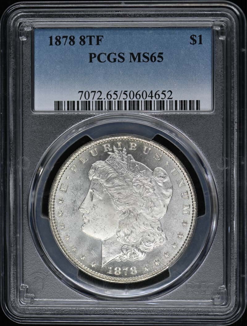 1878 PCGS MS65 Uncirculated Morgan Dollar Philadelphia: 1878 PCGS MS65 Uncirculated Morgan Dollar Philadelphia This 1878 Morgan Dollar is a remarkable piece of American numismatic history, certified by PCGS with a grade of MS65, indicating excellent condit