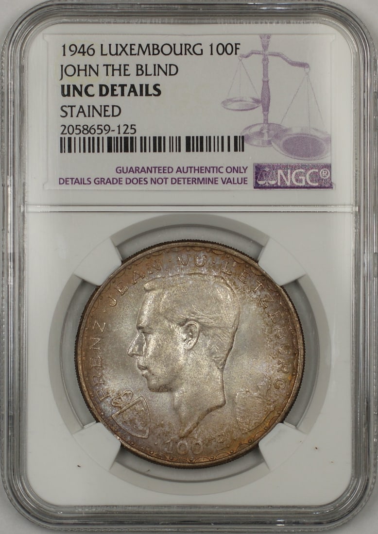 1946 Luxembourg 100 Franc Silver Coin NGC UNC Details John the Blind: 1946 Luxembourg 100 Franc Silver Coin NGC UNC Details John the Blind This is a 1946 Luxembourg John the Blind 100F silver coin graded by NGC as UNC Details with a noted stain. The coin is uncirculated