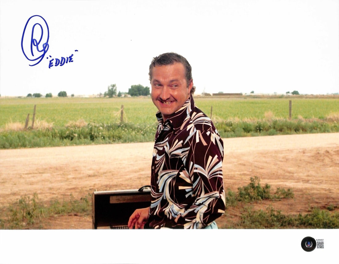 Randy Quaid Cousin Eddie Signed 11x14 Photo Beckett Certified: Randy Quaid Cousin Eddie Signed 11x14 Photo Beckett Certified This is an autographed 11x14 photograph of Randy Quaid, best known for his role as "Cousin Eddie" in the classic film Christmas Vacation.