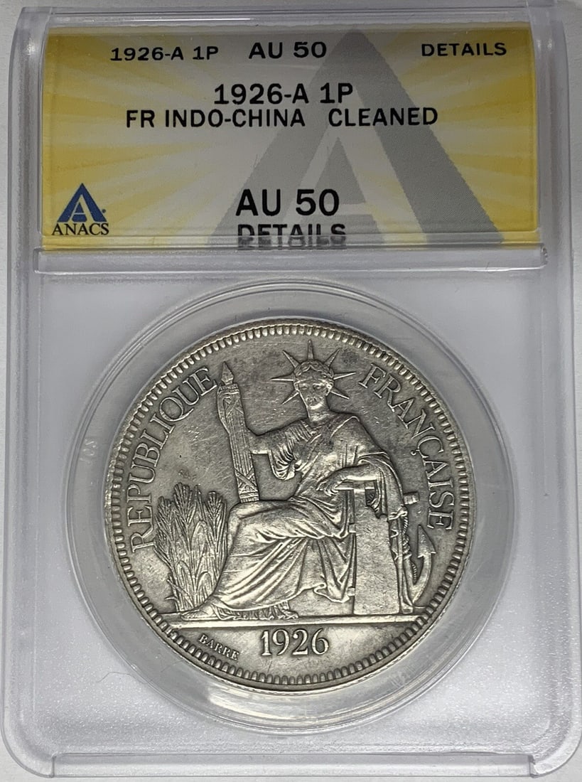 1926 Indo-China Silver 1 Piastre Coin ANACS AU 50 Certified: 1926 Indo-China Silver 1 Piastre Coin ANACS AU 50 Certified This 1926-A French Indo-China 1 Piastre coin is composed of silver and has been certified by ANACS with a grade of AU 50 Details, indicating