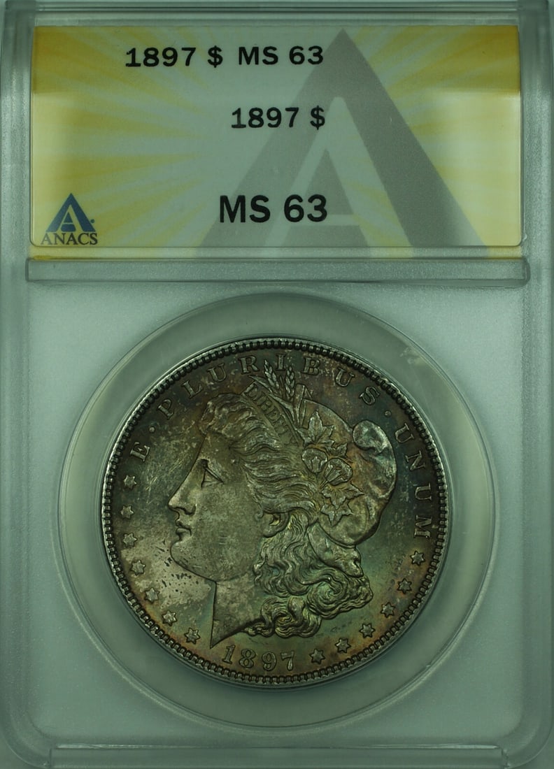 ANACS MS-63 1897 Morgan Dollar Silver $1 Coin with Attractive Toning: ANACS MS-63 1897 Morgan Dollar Silver $1 Coin with Attractive Toning This 1897 Morgan Silver Dollar is an uncirculated coin graded MS-63 by ANACS. Struck in Philadelphia, it features a beautiful natur