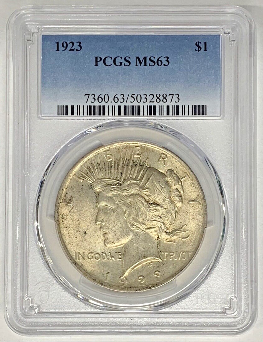 PCGS MS 63 1923 Peace Dollar Silver Coin with Light Toning: PCGS MS 63 1923 Peace Dollar Silver Coin with Light Toning This is a 1923 Peace Silver Dollar coin from the United States. Composed of silver, this uncirculated coin is lightly toned and has been grad