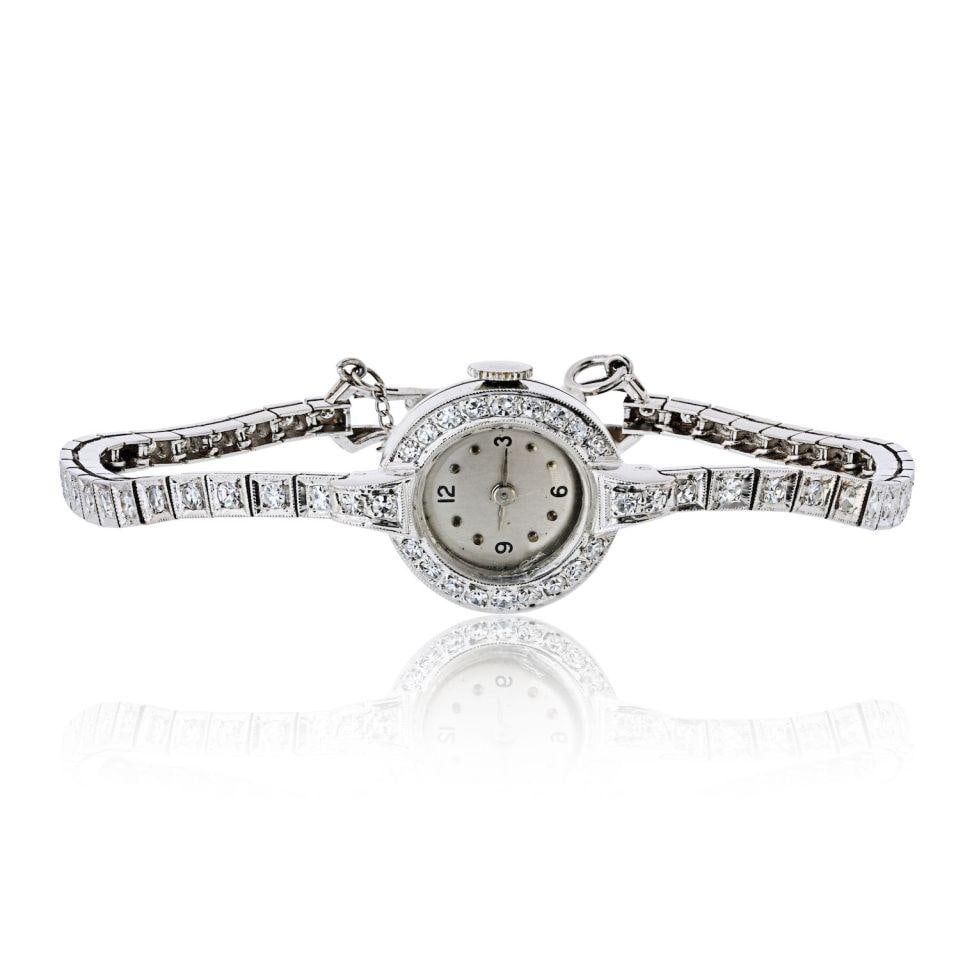 Antique Platinum Manual Watch 1.5ct Diamond Elegant Timepiece: Antique Platinum Manual Watch 1.5ct Diamond Elegant Timepiece This exquisite antique platinum manual watch showcases a classic round dial beautifully adorned with approximately 1.50 carats total weigh