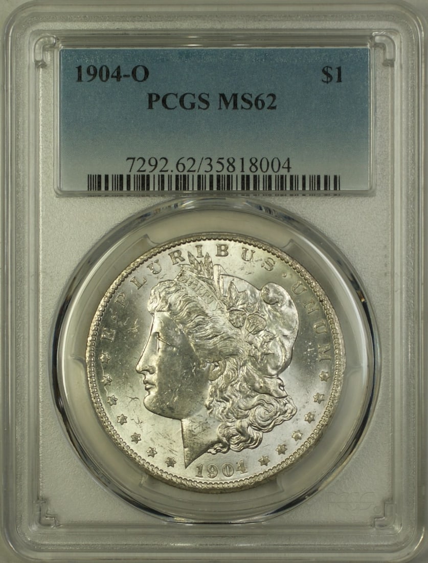 PCGS MS62 1904-O Morgan Dollar Silver Coin New Orleans Mint: PCGS MS62 1904-O Morgan Dollar Silver Coin New Orleans Mint This is a 1904-O Morgan Silver Dollar from the United States, certified by PCGS with a grade of MS 62. Minted in New Orleans, this uncircula