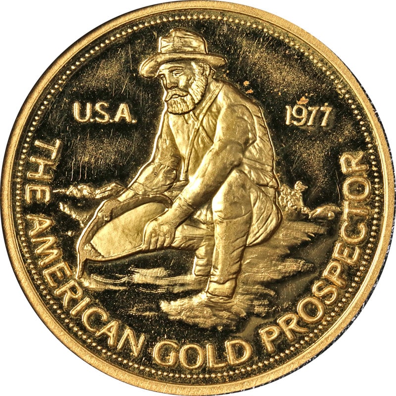 1 oz Engelhard Gold Prospector Round 1977 E MC Logo .9995 Fine: 1 oz Engelhard Gold Prospector Round 1977 E MC Logo .9995 Fine This 1977 Gold Engelhard Prospector is a 1 ounce round composed of .9995 fine gold, featuring the E MC logo. The round has attractive lus