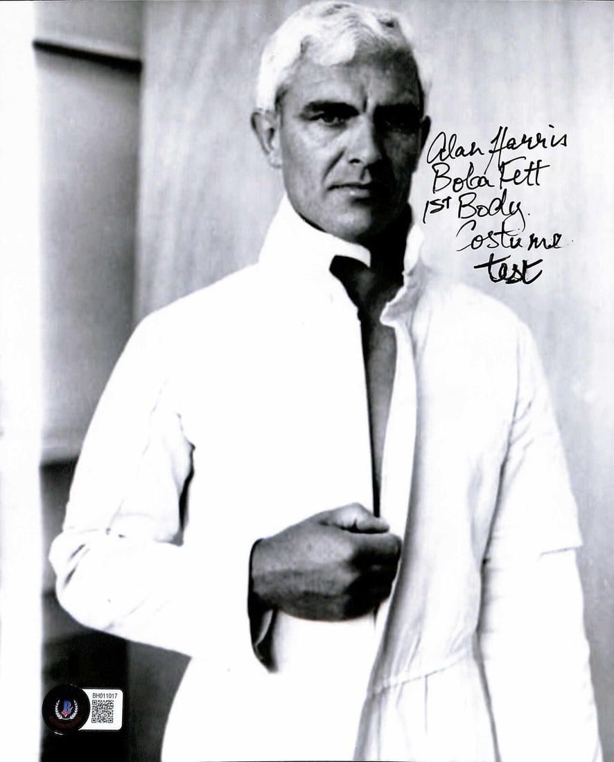 8x10 Photo Signed by Alan Harris as Boba Fett with Beckett Certification: 8x10 Photo Signed by Alan Harris as Boba Fett with Beckett Certification This is an original 8x10 color photograph featuring Alan Harris testing the Boba Fett costume during the pre-production of Star