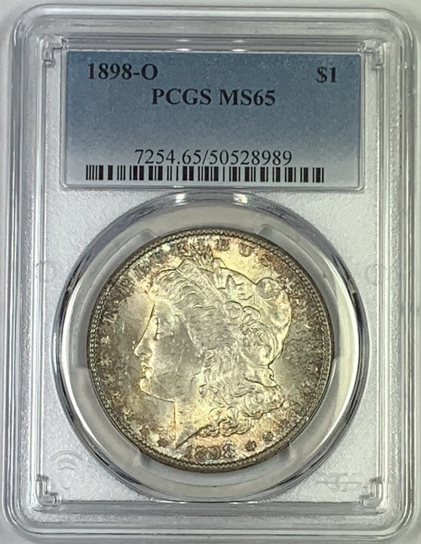 PCGS MS 65 1898-O Toned Morgan Silver Dollar $1 Coin: PCGS MS 65 1898-O Toned Morgan Silver Dollar $1 Coin This is an 1898-O Morgan Silver Dollar featuring attractive toning and graded MS 65 by PCGS. The coin is uncirculated and composed of silver, with
