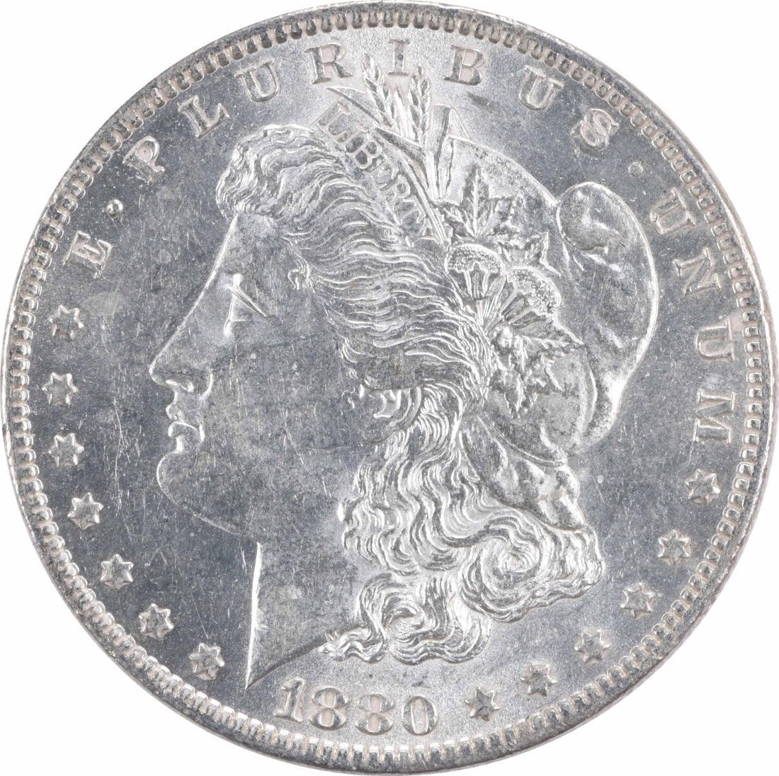 1880 New Orleans Morgan Dollar AU Grade Uncertified Circulated Silver Coin: 1880 New Orleans Morgan Dollar AU Grade Uncertified Circulated Silver Coin This is an 1880-O Morgan Silver Dollar from the United States, featuring the design by George T. Morgan. Minted in New Orlean