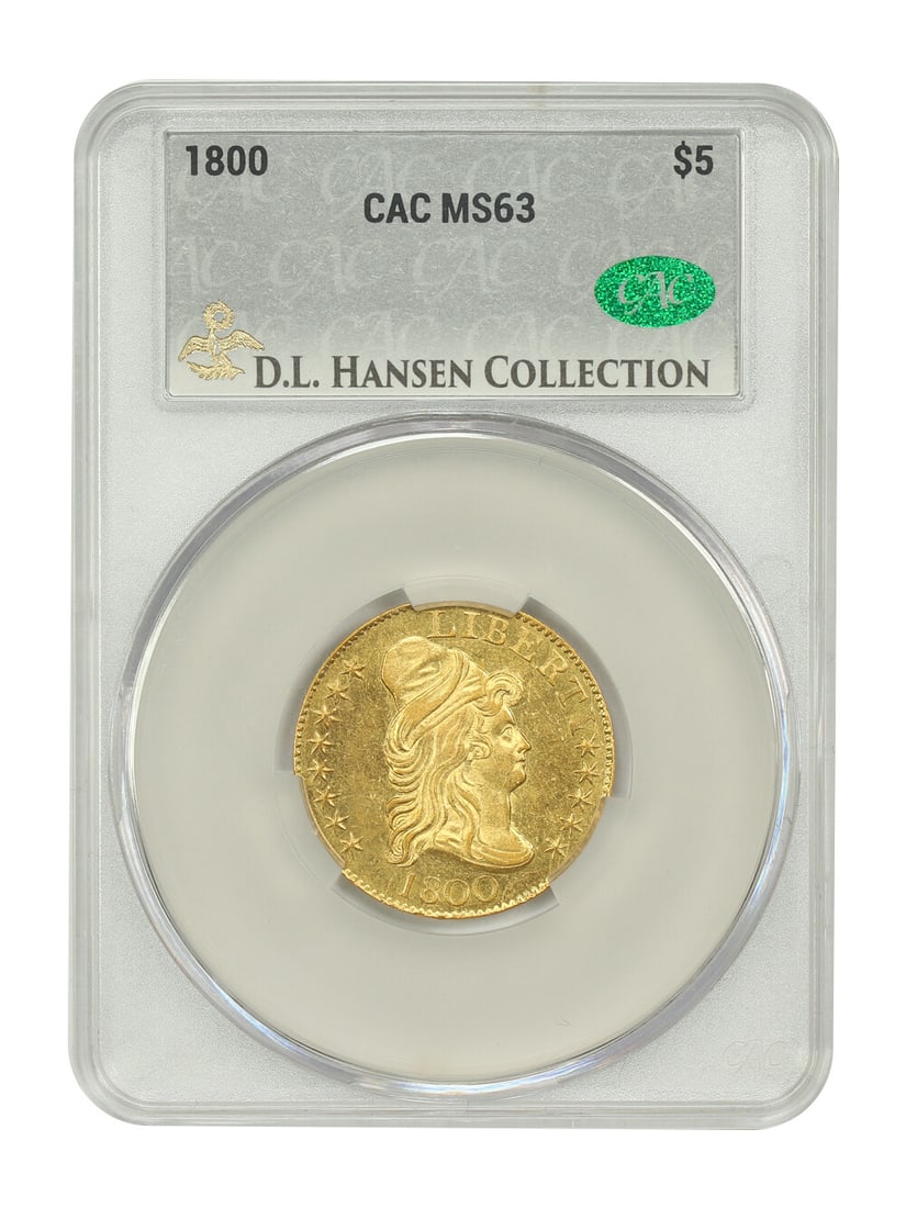1800 Draped Bust $5 Coin CACG MS63 D.L. Hansen Rare Gold: 1800 Draped Bust $5 Coin CACG MS63 D.L. Hansen Rare Gold This 1800 Draped Bust $5 Gold Coin is a stunning example of early American numismatics. Certified by CACG with a grade of MS63, this uncirculat