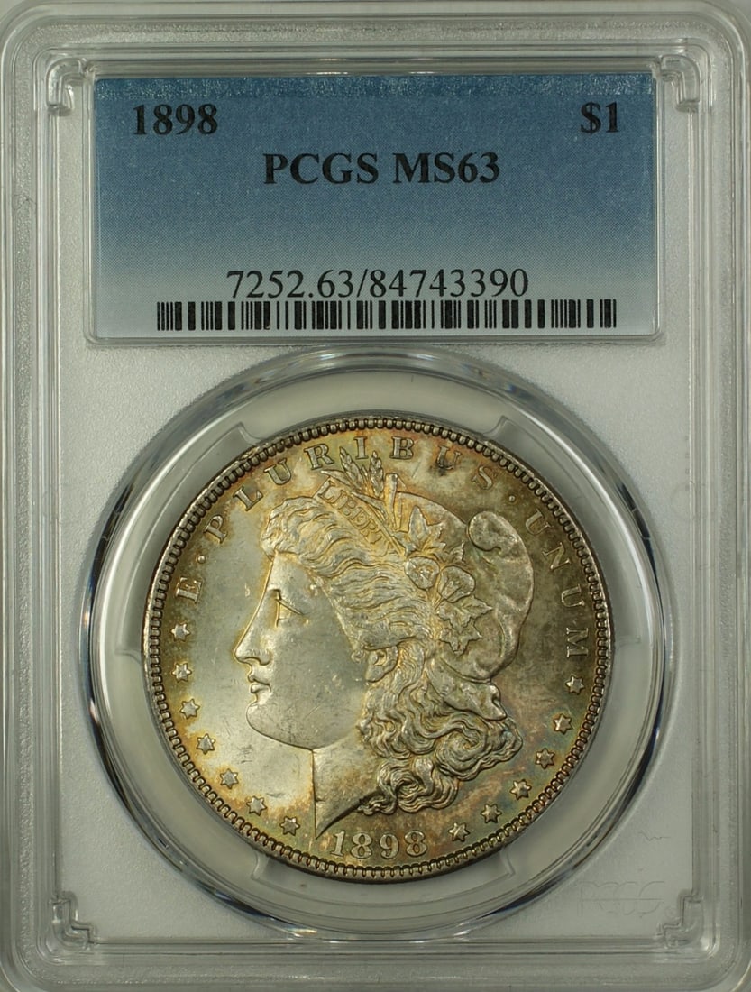 PCGS MS-63 1898 Morgan Dollar Silver $1 Coin Toned Uncirculated: PCGS MS-63 1898 Morgan Dollar Silver $1 Coin Toned Uncirculated This is an 1898 Morgan Silver Dollar $1 coin from the United States, minted in Philadelphia. It is composed of silver and has been certi