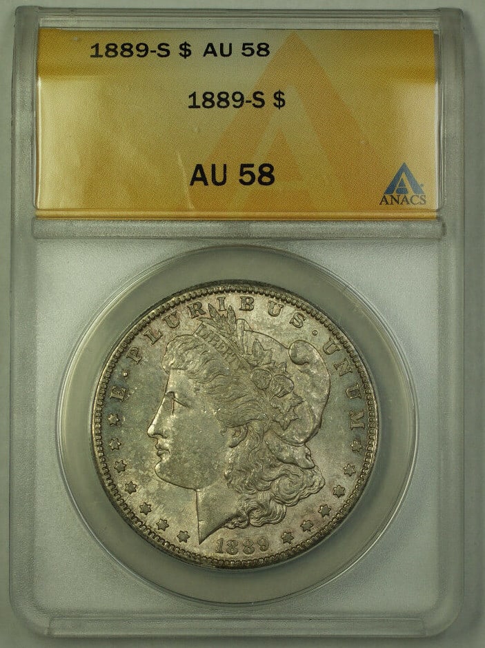 ANACS AU-58 1889-S San Francisco Morgan Silver Dollar $1 Coin: ANACS AU-58 1889-S San Francisco Morgan Silver Dollar $1 Coin This is an 1889-S Morgan Silver Dollar with a denomination of $1, minted in San Francisco. Graded AU 58 by ANACS, this circulated coin is