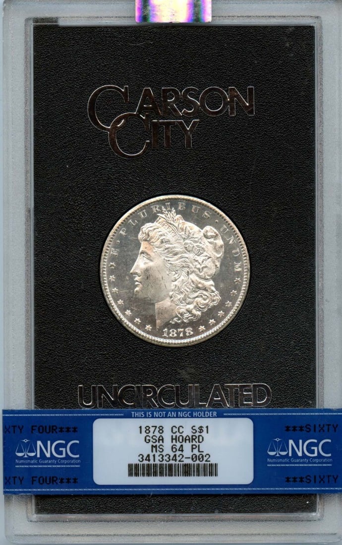 1878-CC Morgan Dollar NGC MS64PL Uncirculated Proof-Like Coin: 1878-CC Morgan Dollar NGC MS64PL Uncirculated Proof-Like Coin This 1878-CC Morgan Dollar is a remarkable piece from the GSA hoard, certified by NGC with a stunning grade of MS64PL. The coin features a
