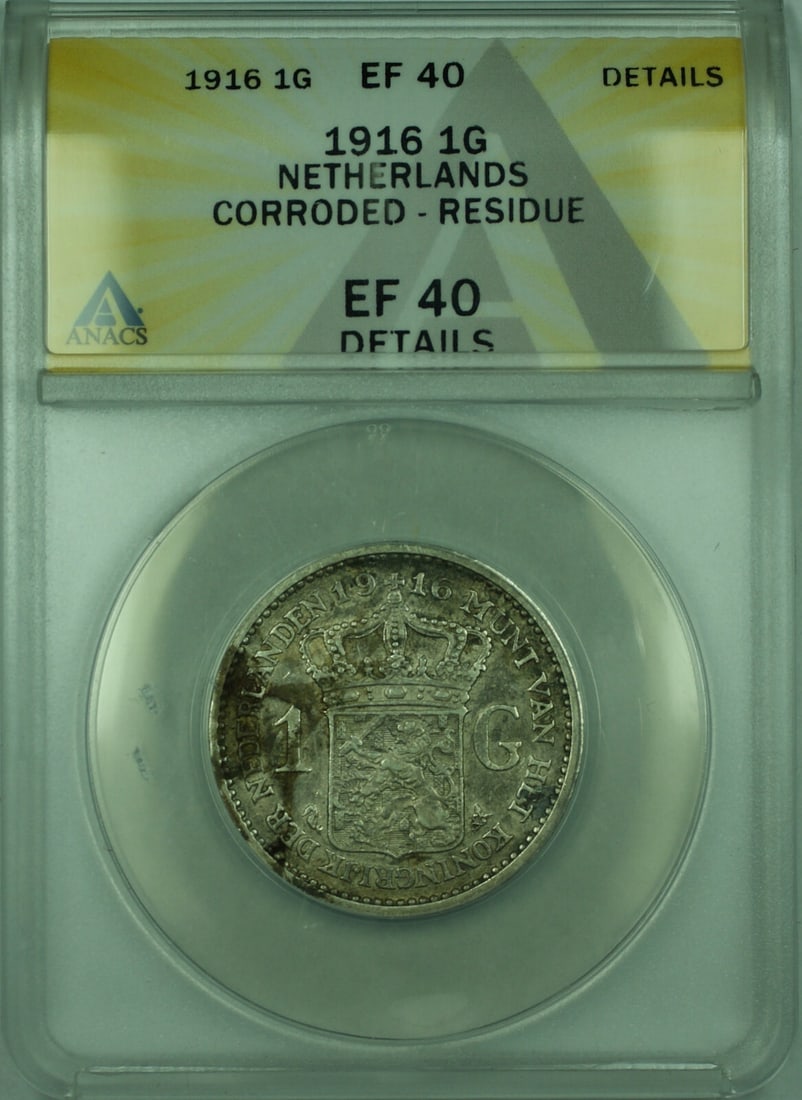 Netherlands 1916 Silver 1 Gulden ANACS EF 40 Details KM 148 Corroded Residue: Netherlands 1916 Silver 1 Gulden ANACS EF 40 Details KM 148 Corroded Residue This 1916 Netherlands 1 Gulden silver coin is certified by ANACS with a grade of EF 40 (Extremely Fine) and noted for corro
